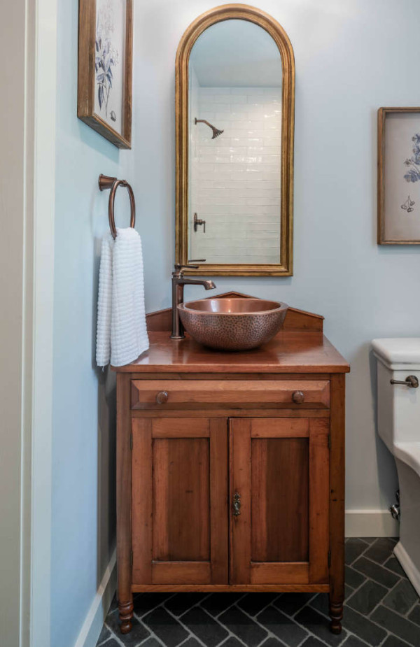 blue-bathroom-gold-mirror-copper-sink