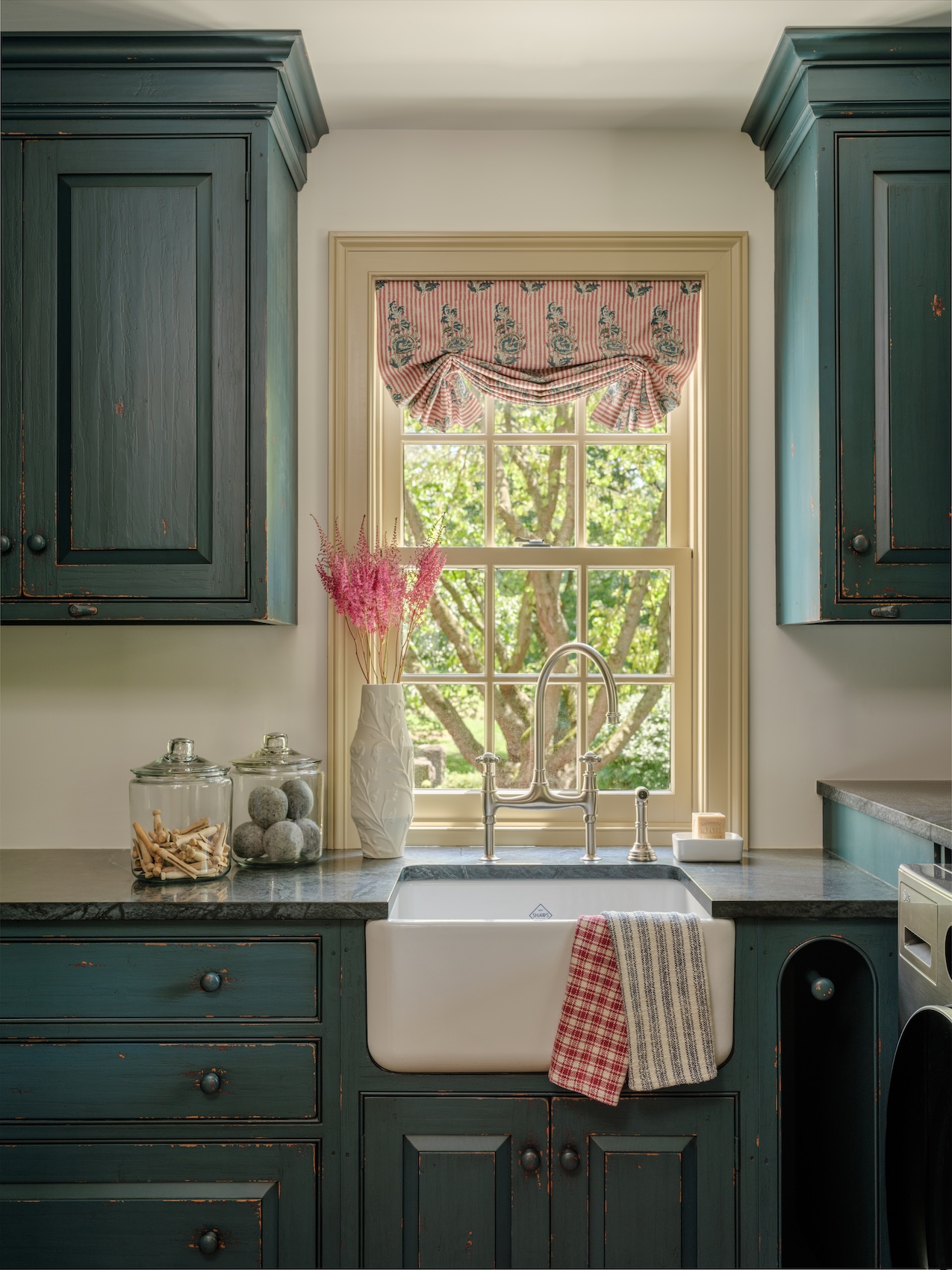 farmhouse-sink-blue-green-dark-cabinets-kitchen-design